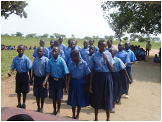 Singing and dancing performance by the pupils