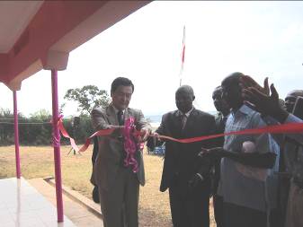 Ribbon cutting in front of the health centre