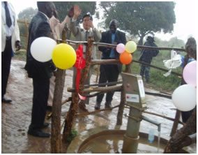 Ambassador tests the borehole and commissions the project