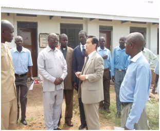 The Ambassador consulting with the district officials and the school management