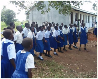 Pupils of Awiri Primary school presenting a song 