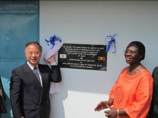 Unveiling plaque in front of pump house