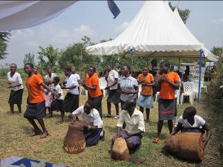 Girl students from community performing traditional dance