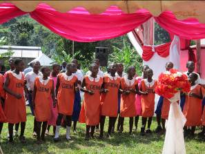 Community children singing to express their thanks
