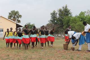 Dance of appreciation by girl students in front of the new dormitory