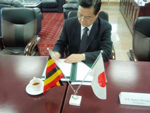 Ambassador signing the Grant Contract