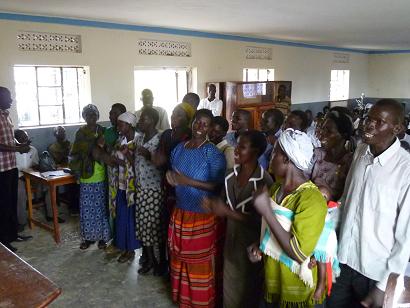 Local farmers singing local music and dancing to express their appreciation