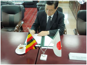 Ambassador signing the Grant Contract