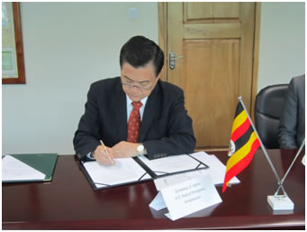 Ambassador signing the Grant Contract
