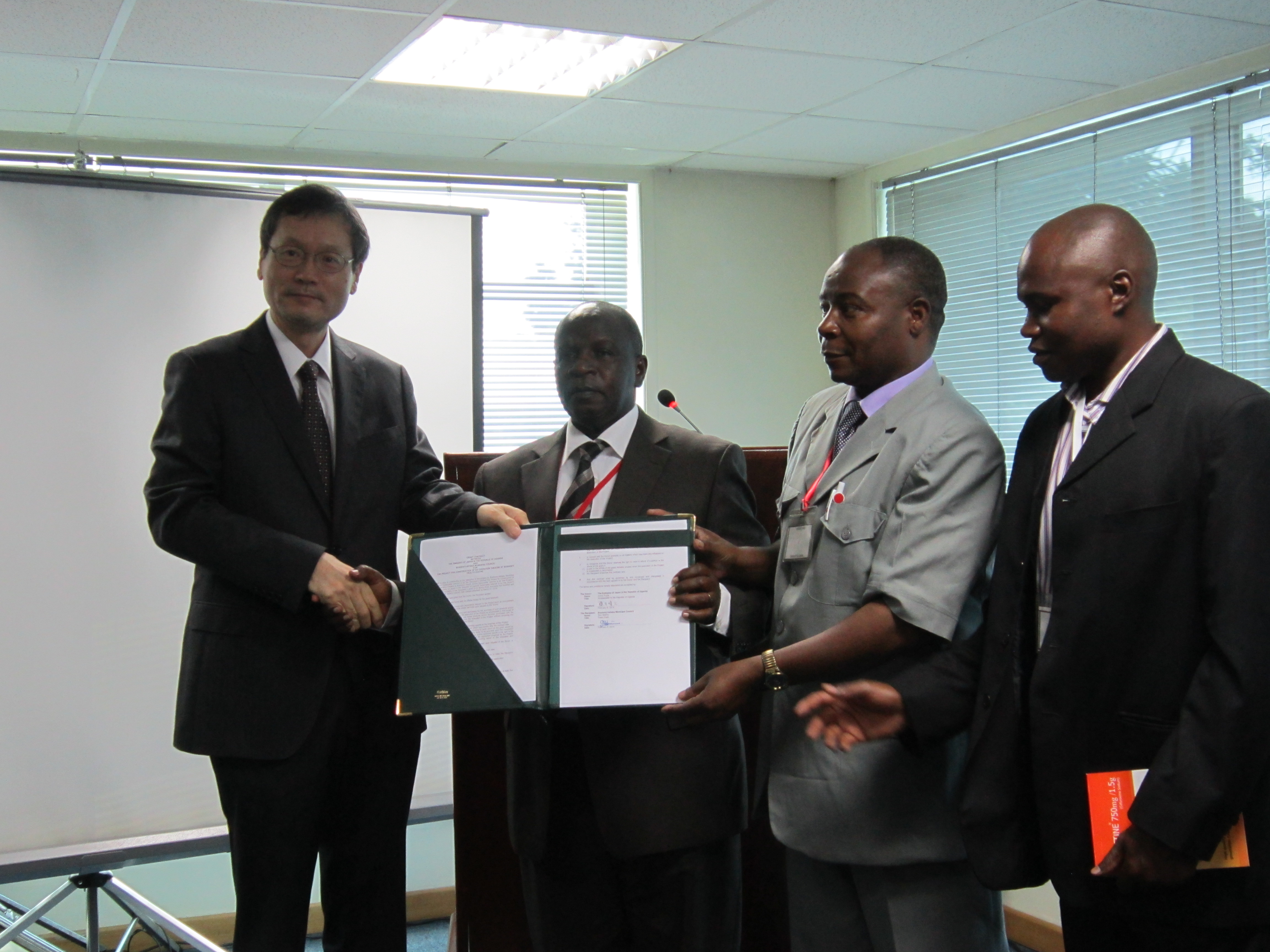 Ambassador signing the Grant Contract