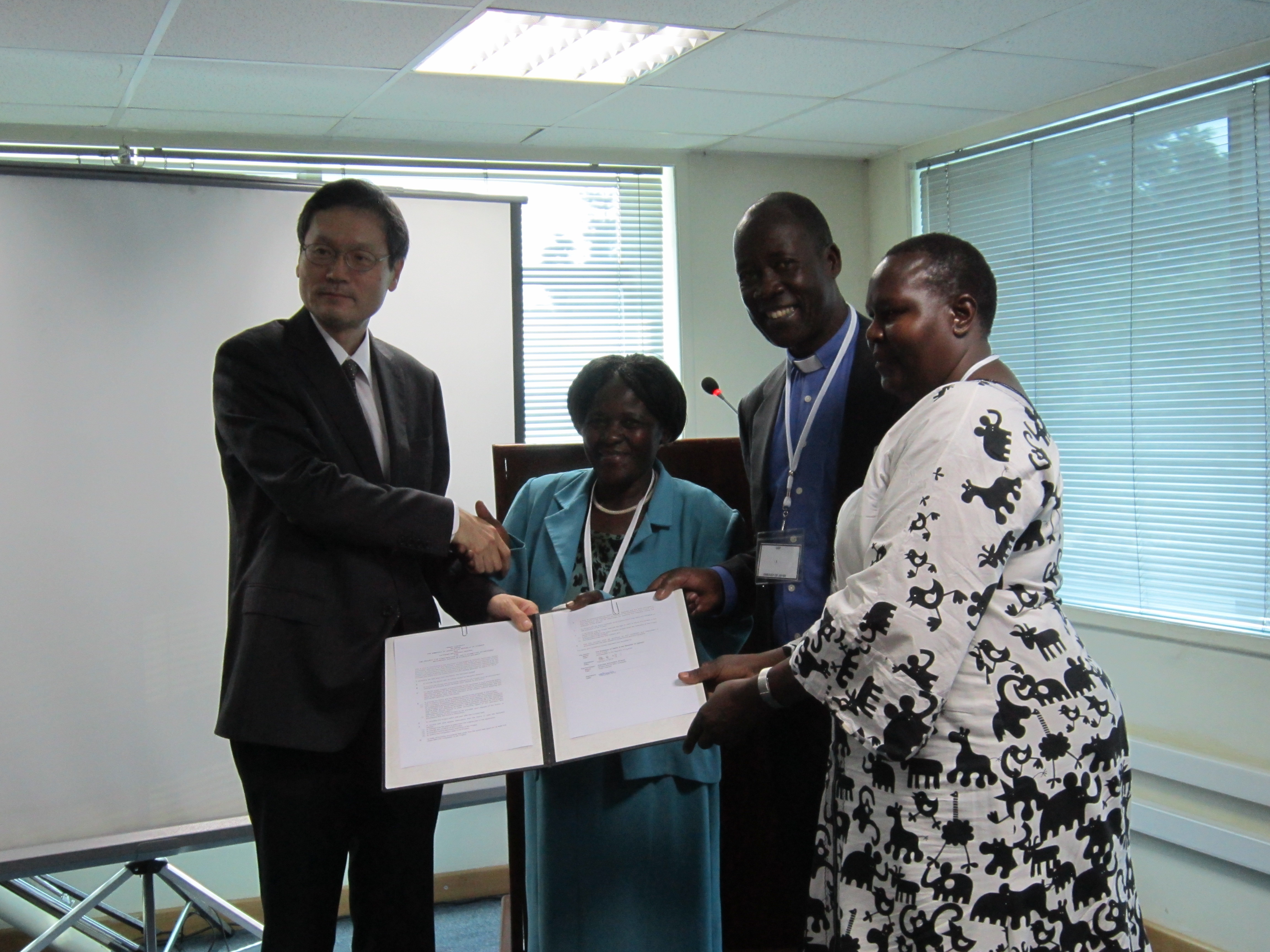 Ambassador signing the Grant Contract
