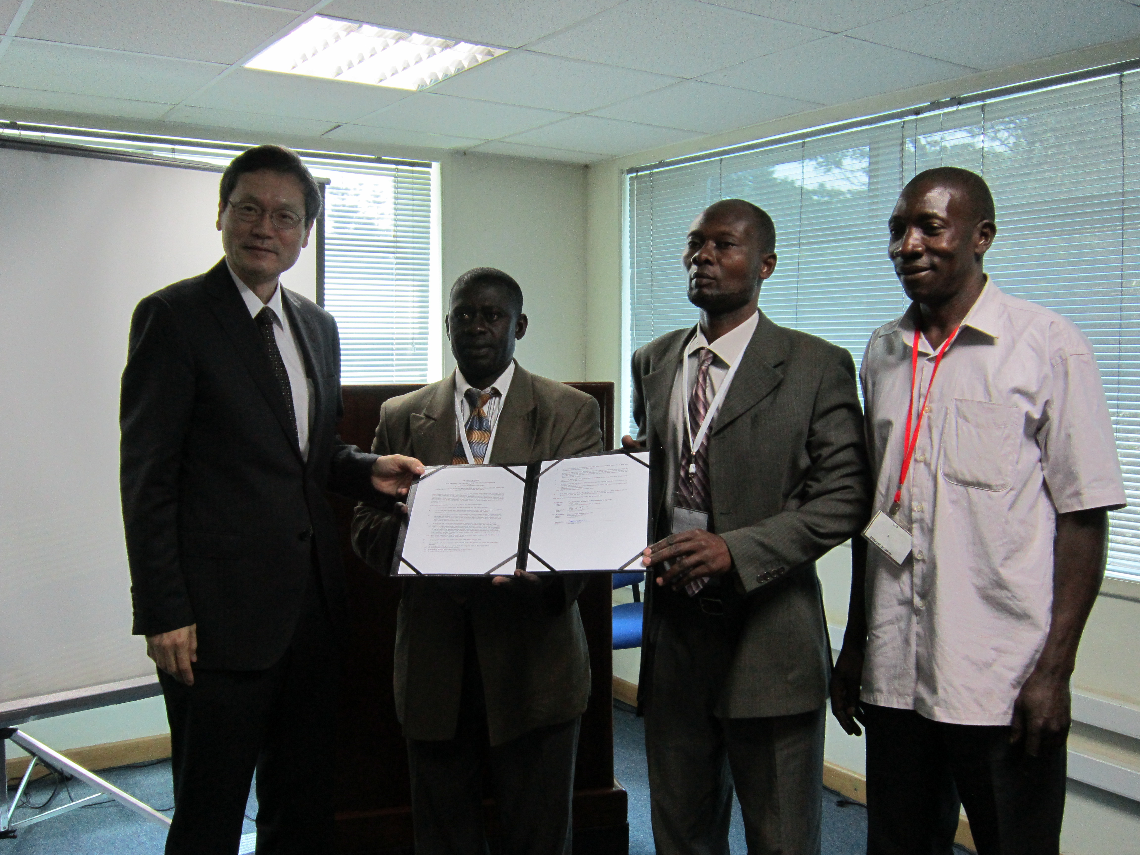 Ambassador signing the Grant Contract